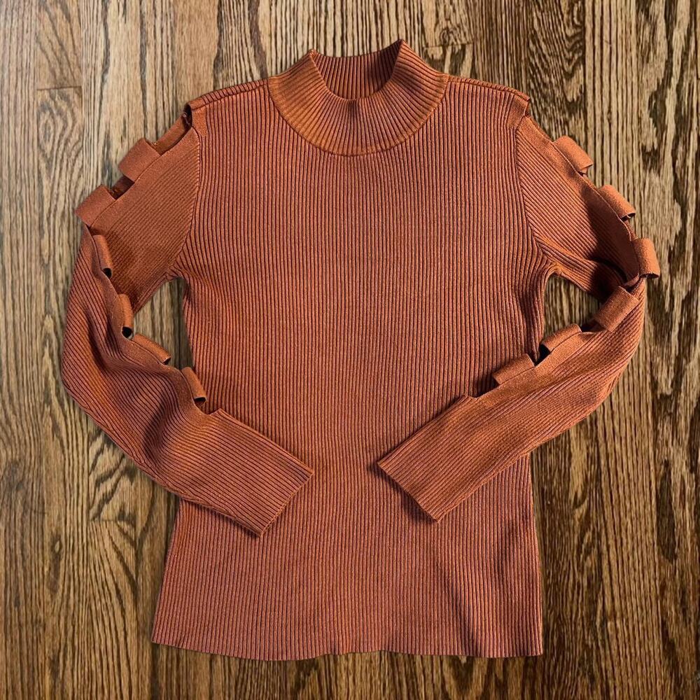 Rust orange ribbed knit top